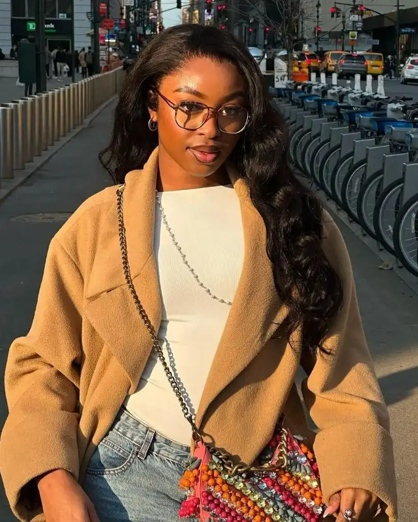 Fall Hair Colors for Black Women 2026 Effortless New York Cool With Bouncy Chocolate Waves