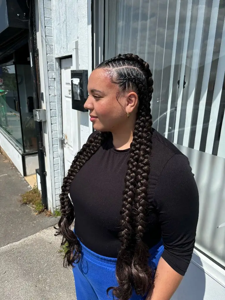 Butterfly Braids Hairstyle Classic Four Cornrows with Goddess Curl Ends and Clean Parts