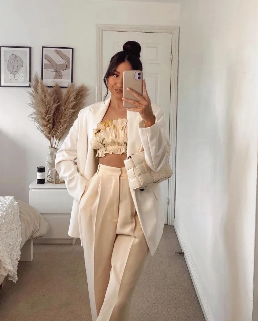 Fall professional outfit cream blazer cream trousers floral crop top white bag