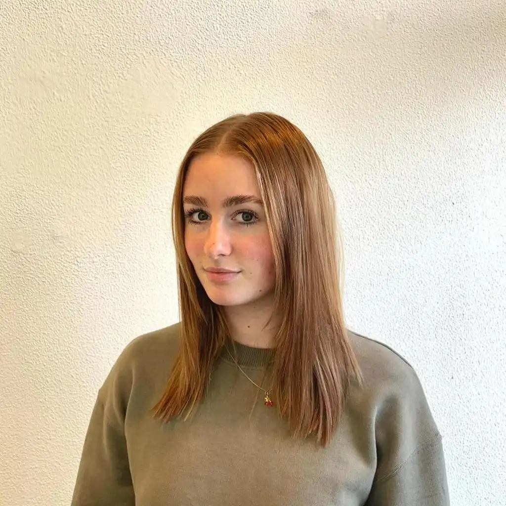 Fall Haircuts for Women 2026 Copper-Strawberry Lob with Sleek Texture and Blunt Ends