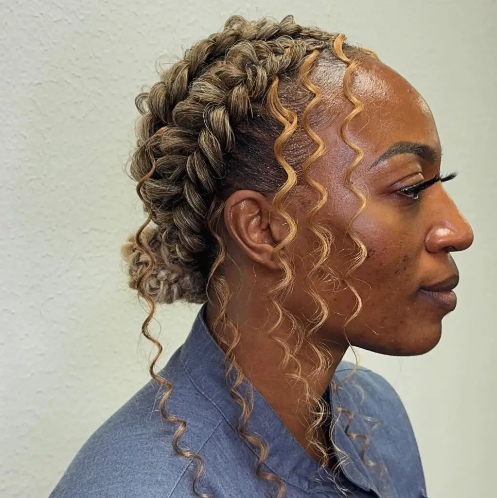 Butterfly Braids Hairstyle Honey-Highlighted Braids Swept Back with Blonde Curly Tendrils