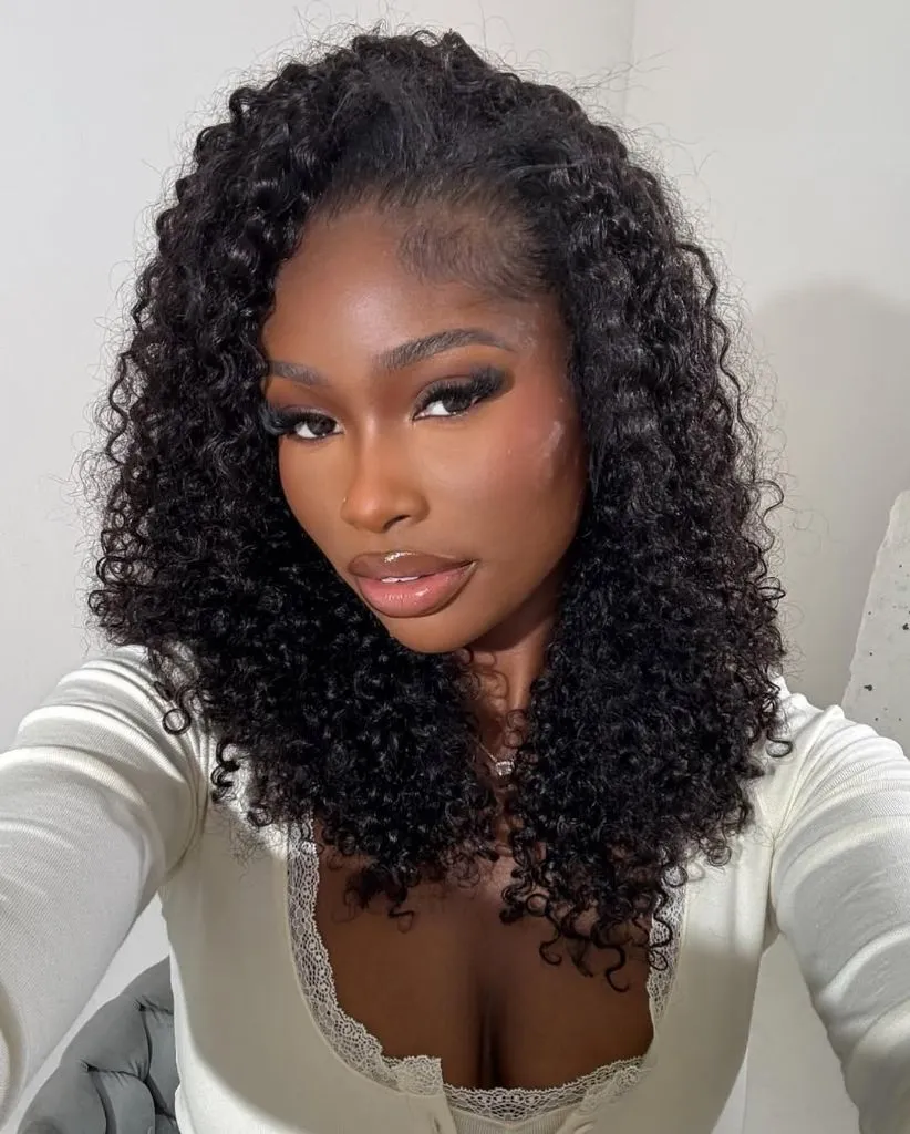 Fall Hair Colors for Black Women 2026 Defined Curly Bob in Rich Natural Black