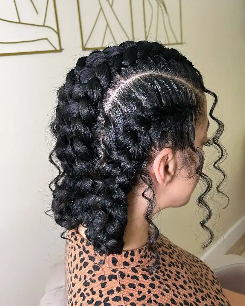 Butterfly Braids Hairstyle Two Large Dutch Braids with Loose Romantic Curls Throughout