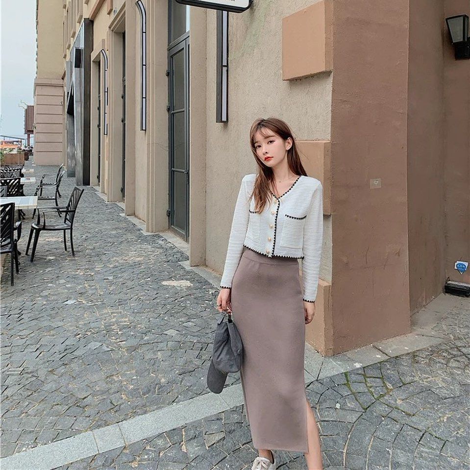 Cropped white tweed jacket with mauve knit midi skirt