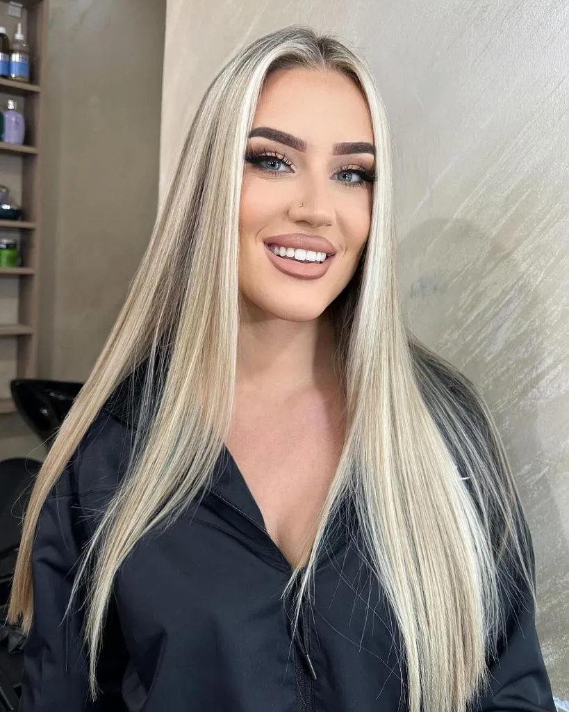 Fall Hair Colour Ideas 2026 Sleek Platinum Blonde With Dark Root Contrast