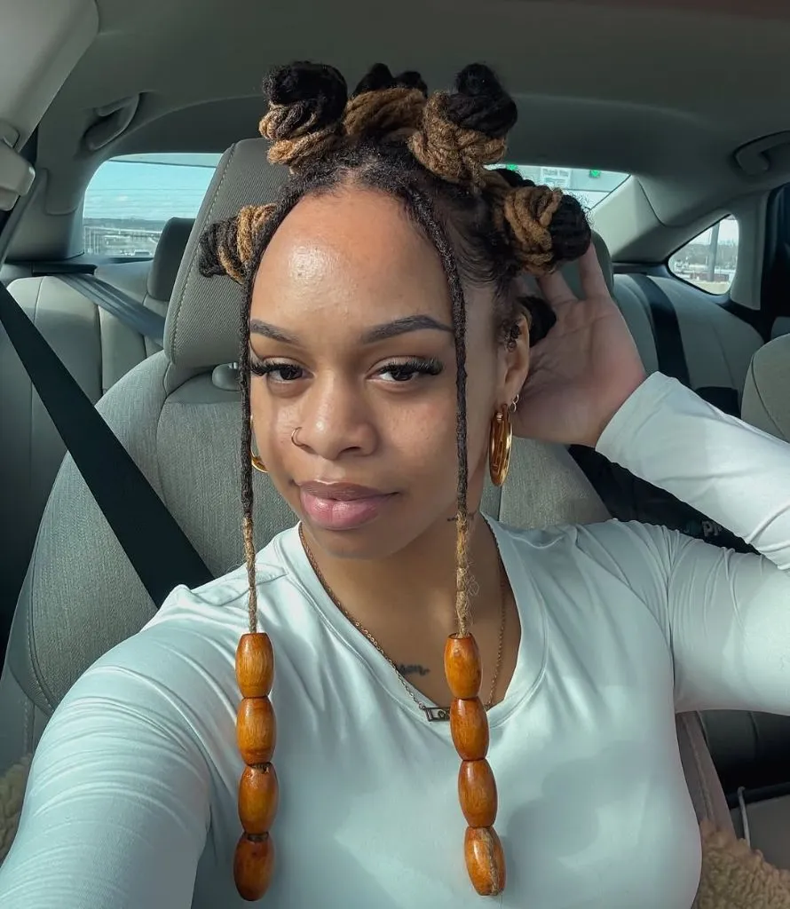 Locs Hairstyles for Black Women Playful Bantu Knots With Beaded Loc Accents