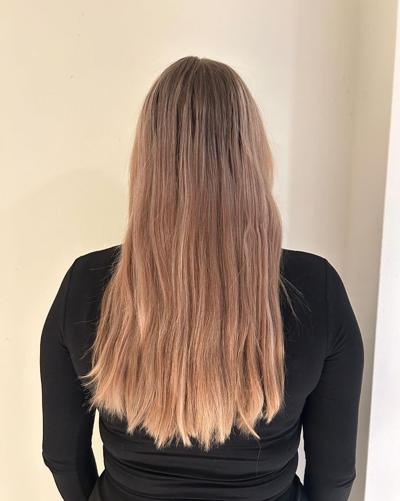 Fall Haircuts for Women 2026 Faded Rose-Toned Blonde with Dark Roots and Long Layers