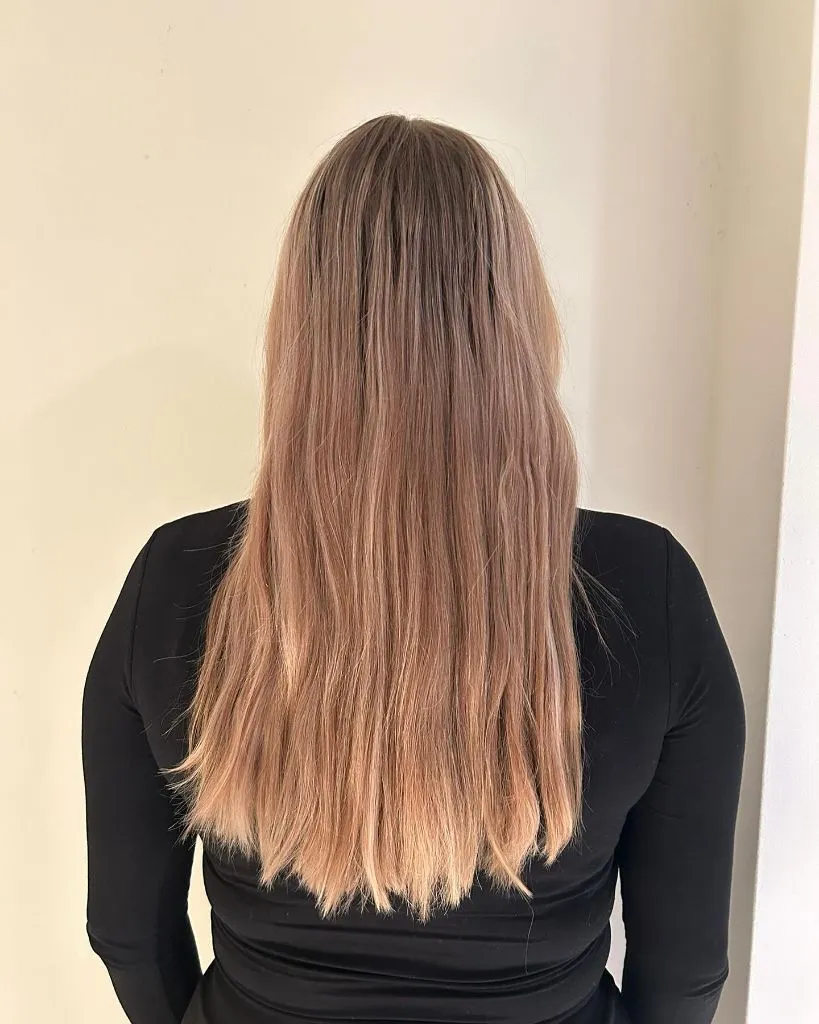 Fall Haircuts for Women 2026 Faded Rose-Toned Blonde with Dark Roots and Long Layers
