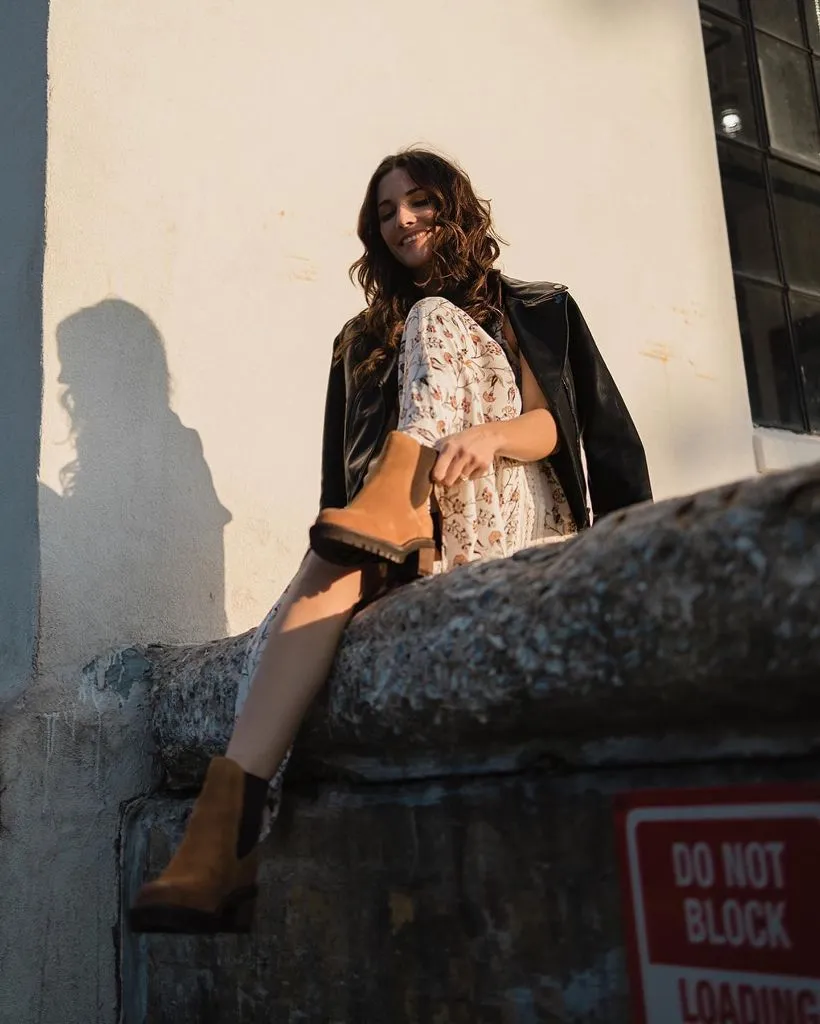 Floral maxi dress with black leather jacket and tan Chelsea boots