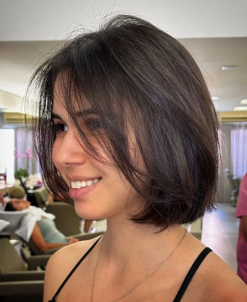 Fall Short Haircuts 2026 Textured Chocolate Bob with Wispy Curtain Bangs