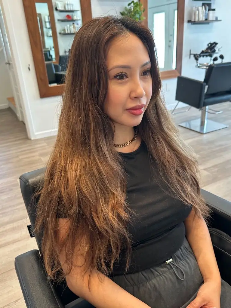Fall Medium Haircuts 2026 Textured Long Brunette with Wavy Air-Dried Movement