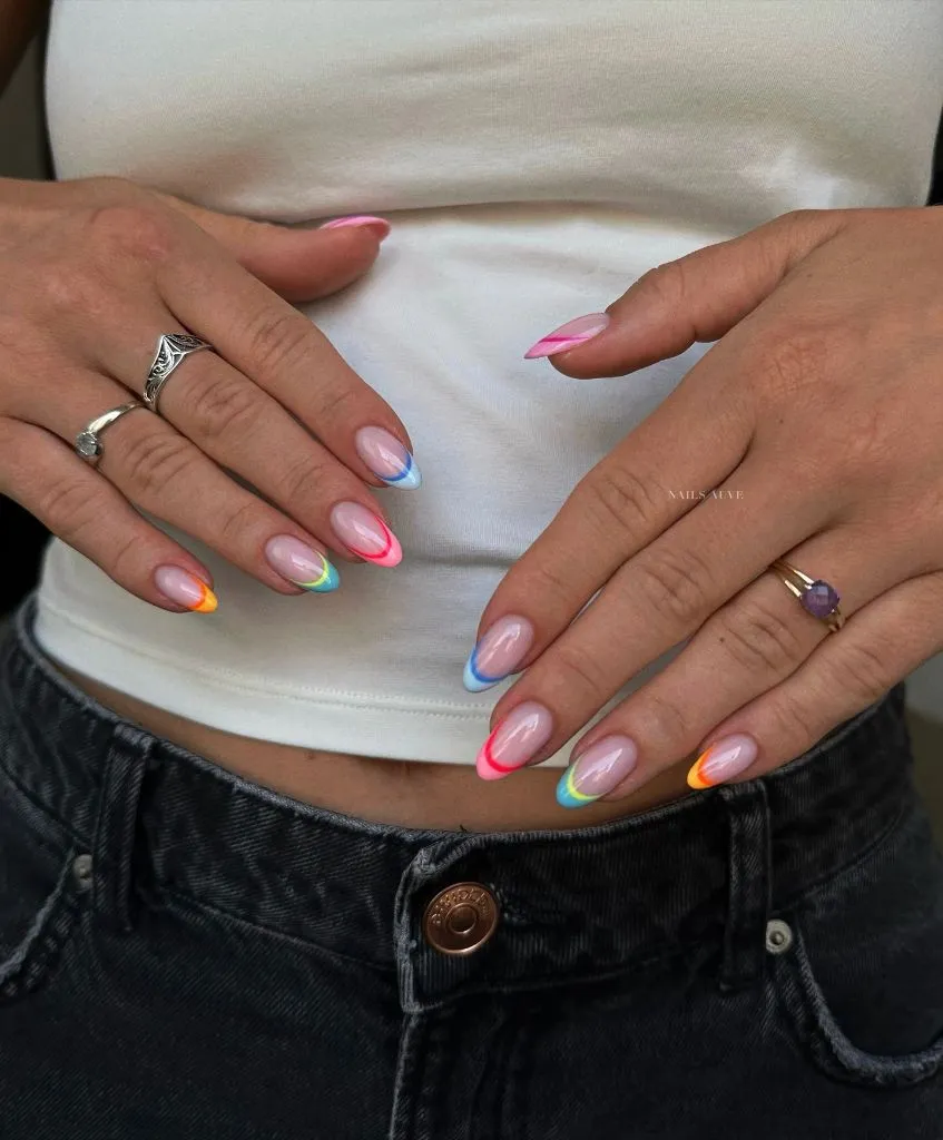 Rainbow gradient colorful French tips on almond nails August nails color 2026 ideas