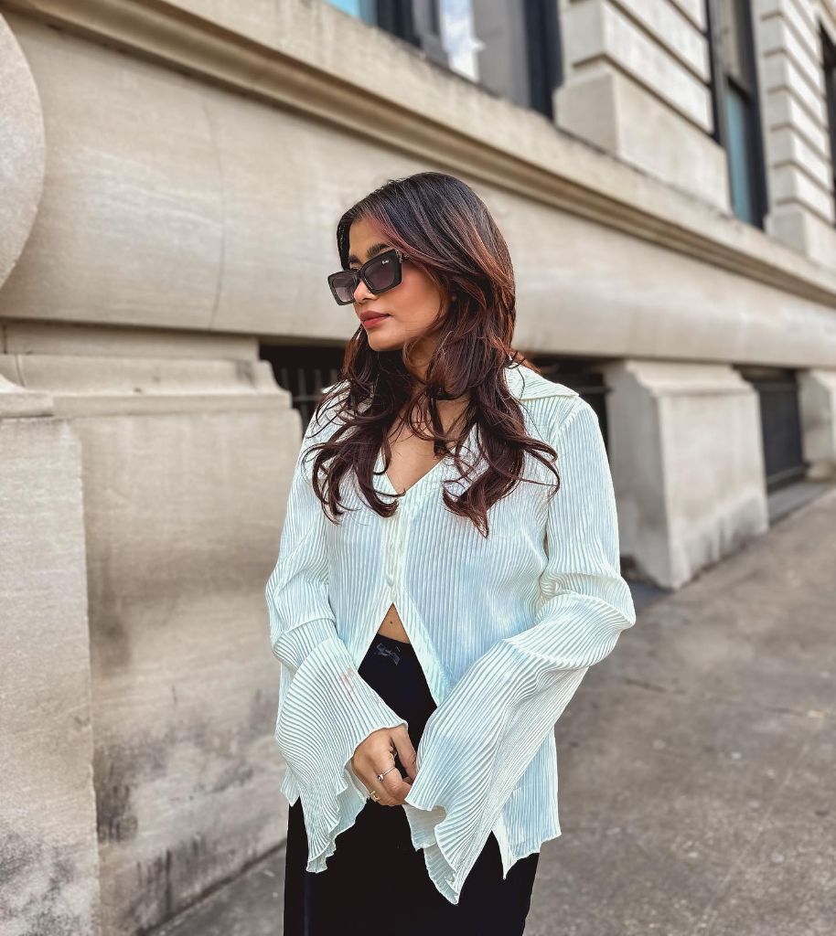 Fall professional outfit white pleated blouse sunglasses black pants