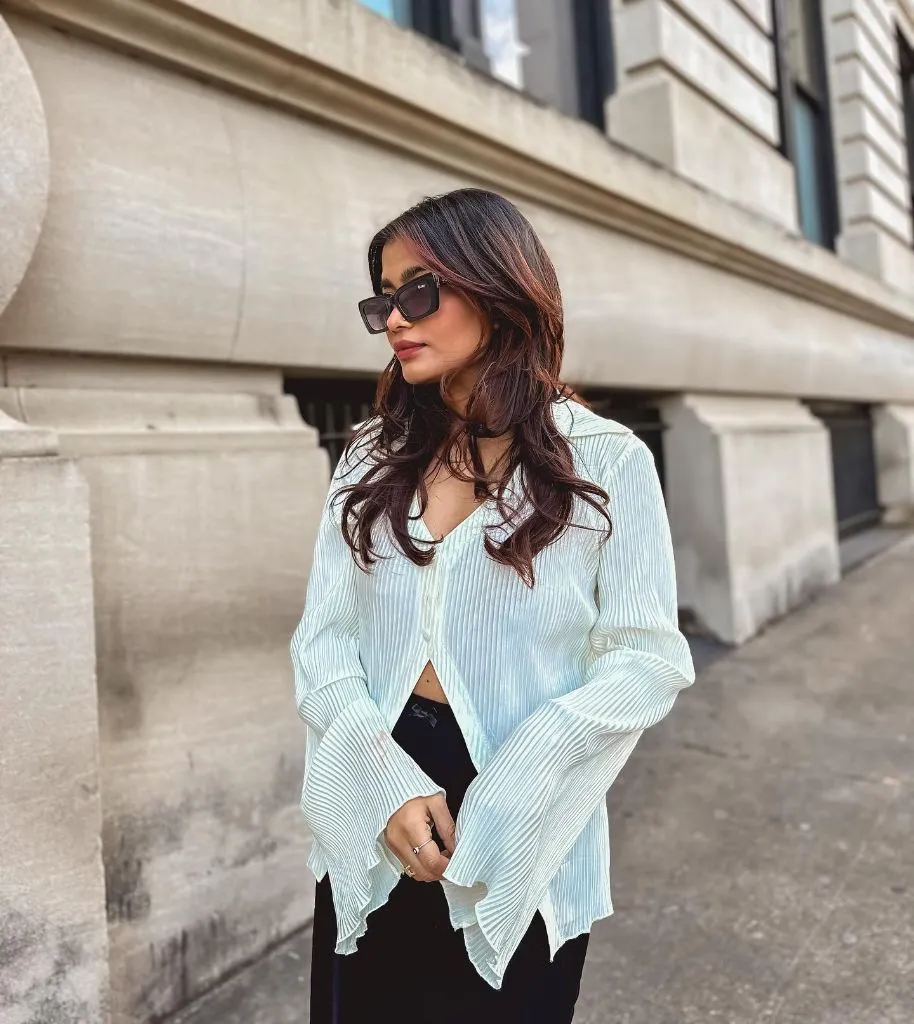 Fall professional outfit white pleated blouse sunglasses black pants