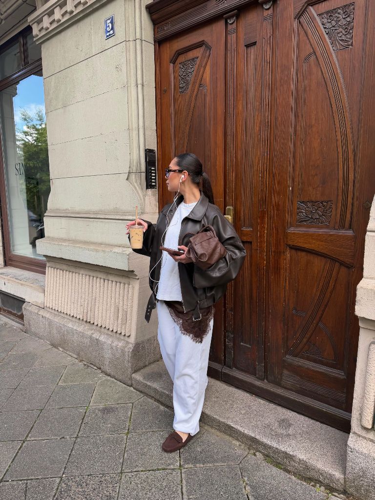 Brown leather jacket and white outfit