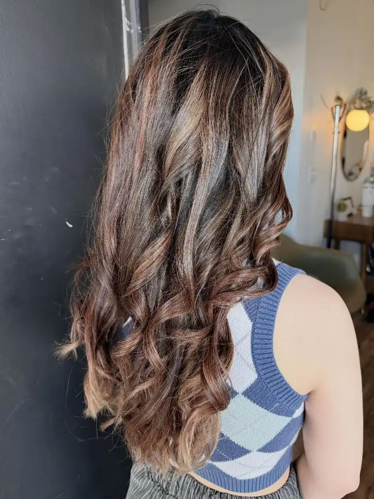 Fall Hairstyles for Long Hair 2026 Warm Dimensional Brunette Curls With Honey-Toned Highlights