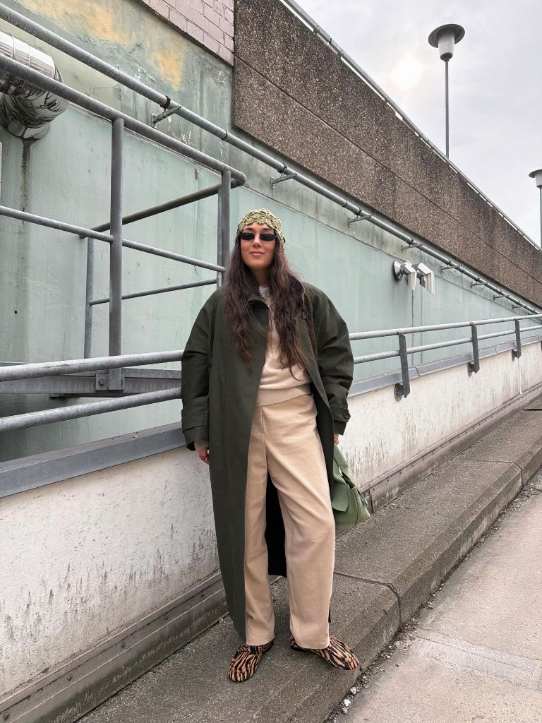 Olive overcoat with beige outfit