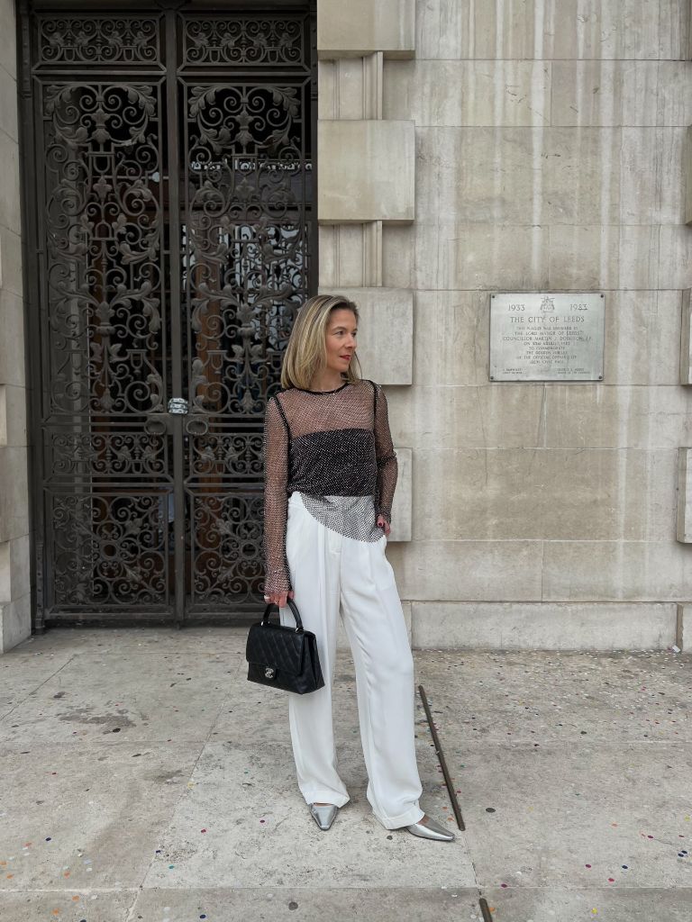 Sheer top and white trousers