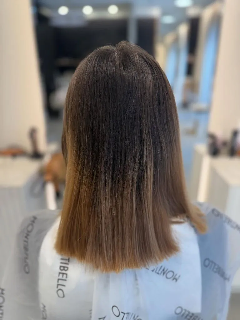 Fall Medium Haircuts 2026 Straight Medium-Length Cut with a Natural Ombre Fade