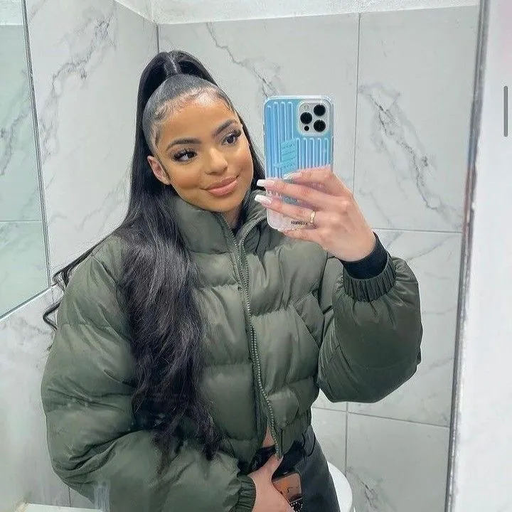 Fall Hair Colors for Black Women 2026 Sleek High Ponytail With Jet Black Glass-Like Shine
