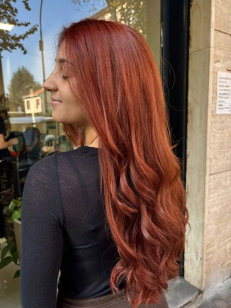 Fall Hairstyles for Long Hair 2026 Rich Auburn Copper With Glossy Curtain Waves