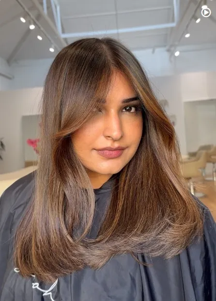 Fall Brunette Hair Colour 2026 Sleek Cinnamon Brunette With Glossy Curtain Fringe