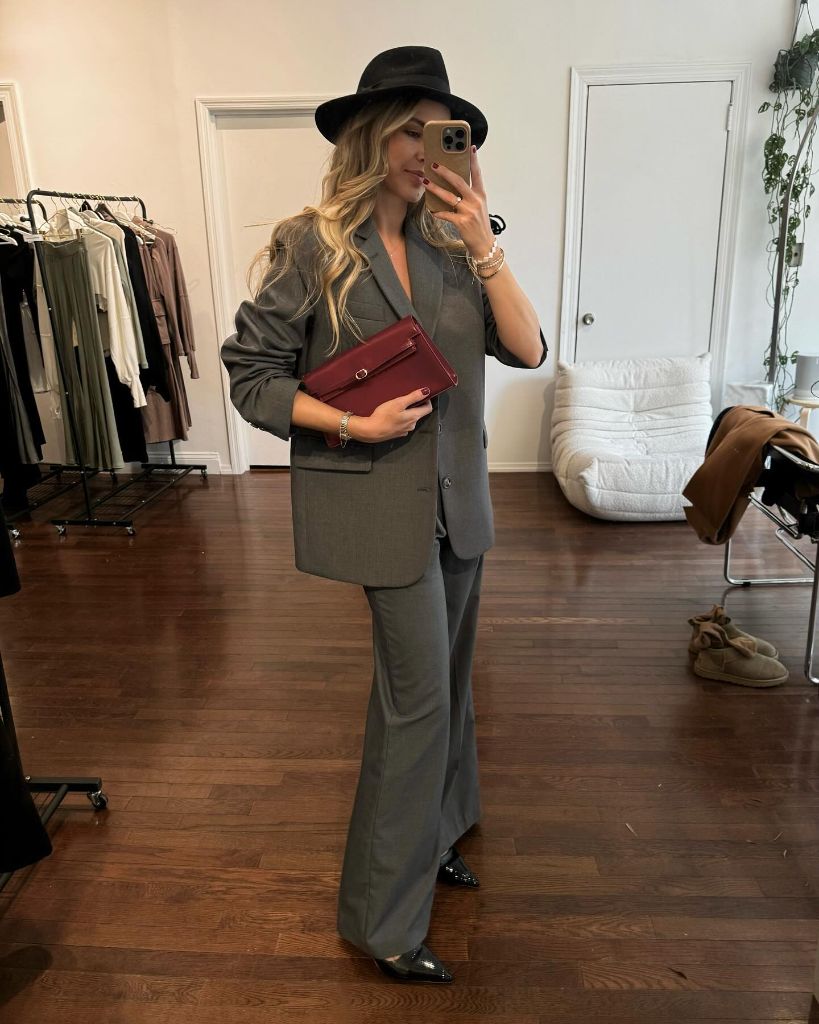 Fall professional outfit grey blazer suit burgundy clutch black fedora pointed flats