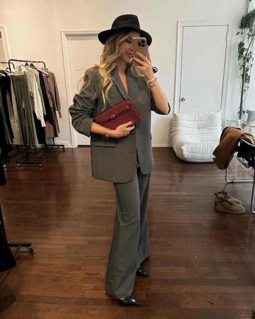 Fall professional outfit grey blazer suit burgundy clutch black fedora pointed flats