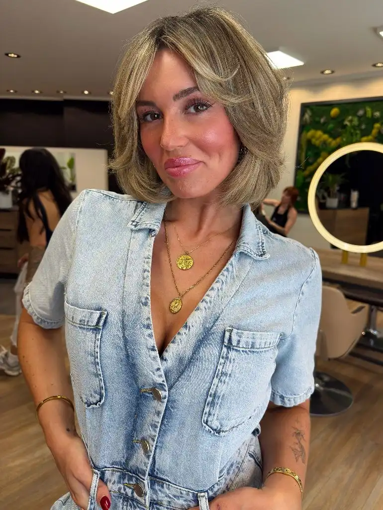 Fall Short Haircuts 2026 Flirty Blonde Bob with Flipped Ends and Curtain Layers