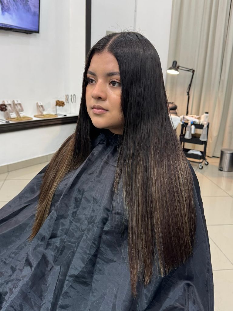 Fall Medium Haircuts 2026 Sleek Dark Brunette with Razor-Straight Precision