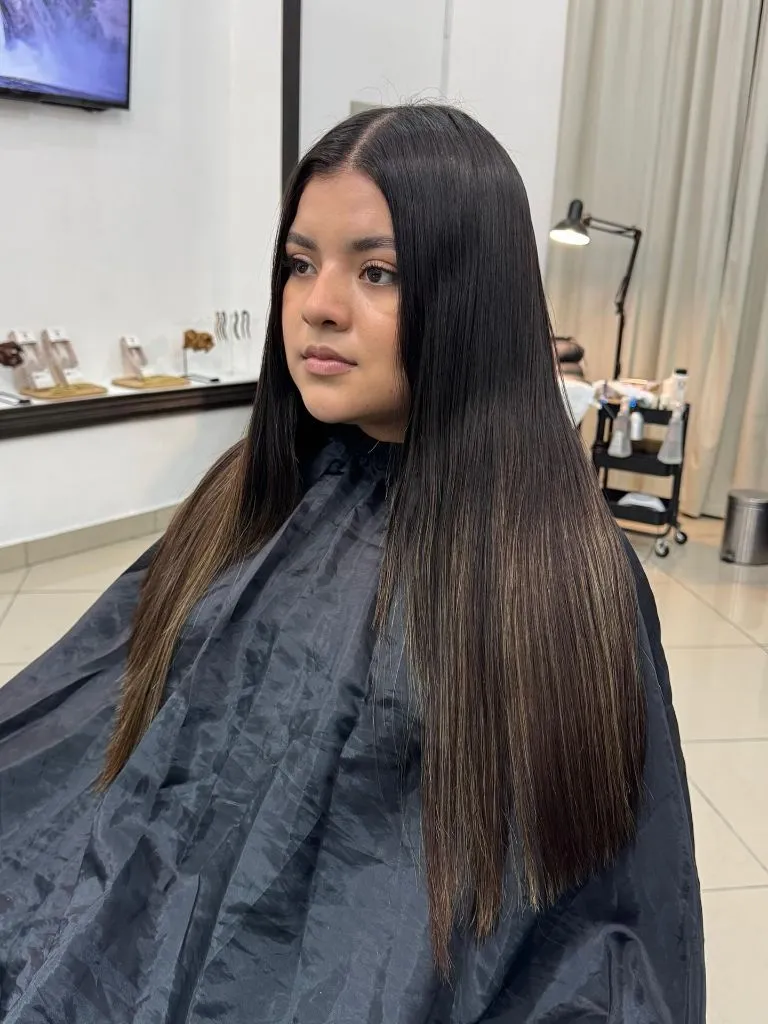 Fall Medium Haircuts 2026 Sleek Dark Brunette with Razor-Straight Precision