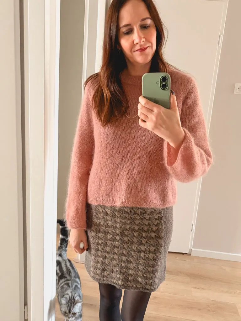 Pink mohair sweater with houndstooth knit mini skirt
