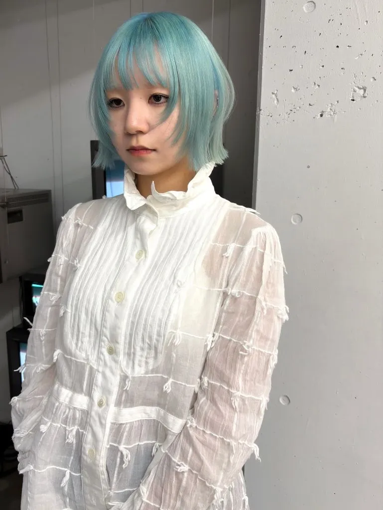 Fall hairstyles for short hair 2026 Soft Aqua Blue Bob with Blunt Bangs
