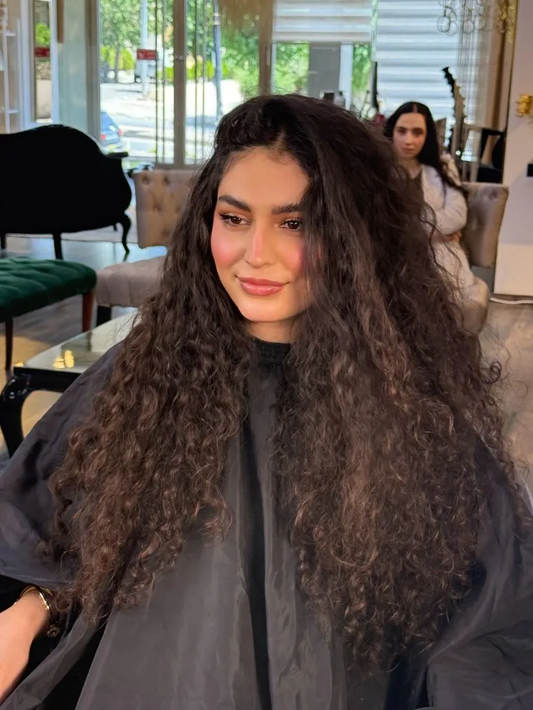 Fall Hair Colour Ideas 2026 Voluminous Natural Curls in Deep Chocolate