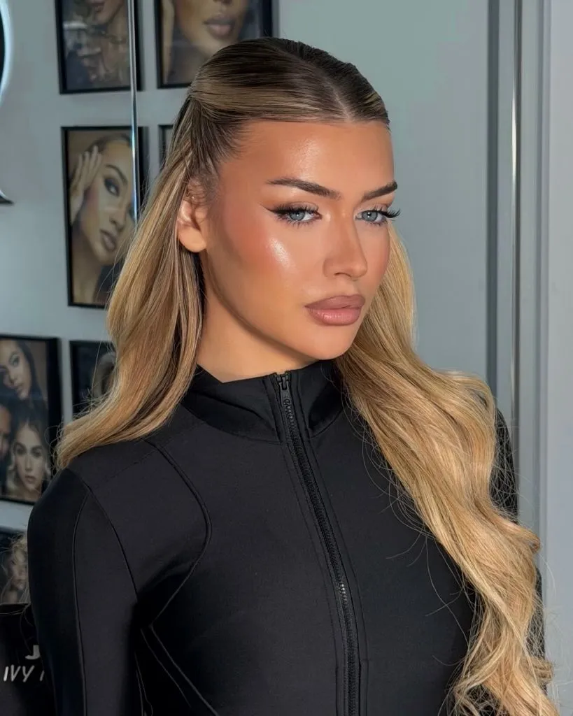 Fall Hairstyles for Office 2026 Slicked-Back Glamour Waves on Blonde Highlighted Hair