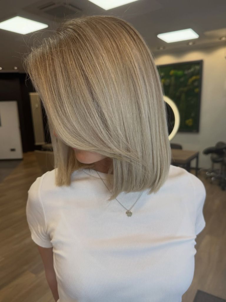 Fall Short Haircuts 2026 Sleek Ash Blonde Long Bob with Mirror-Like Finish
