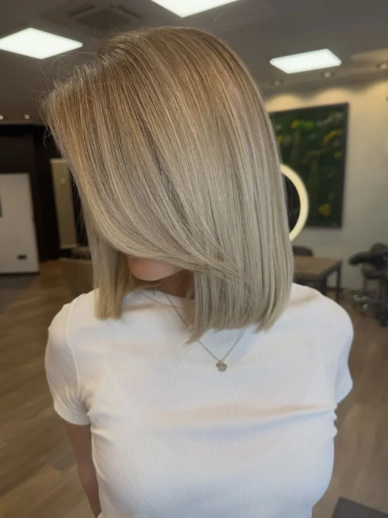 Fall Short Haircuts 2026 Sleek Ash Blonde Long Bob with Mirror-Like Finish