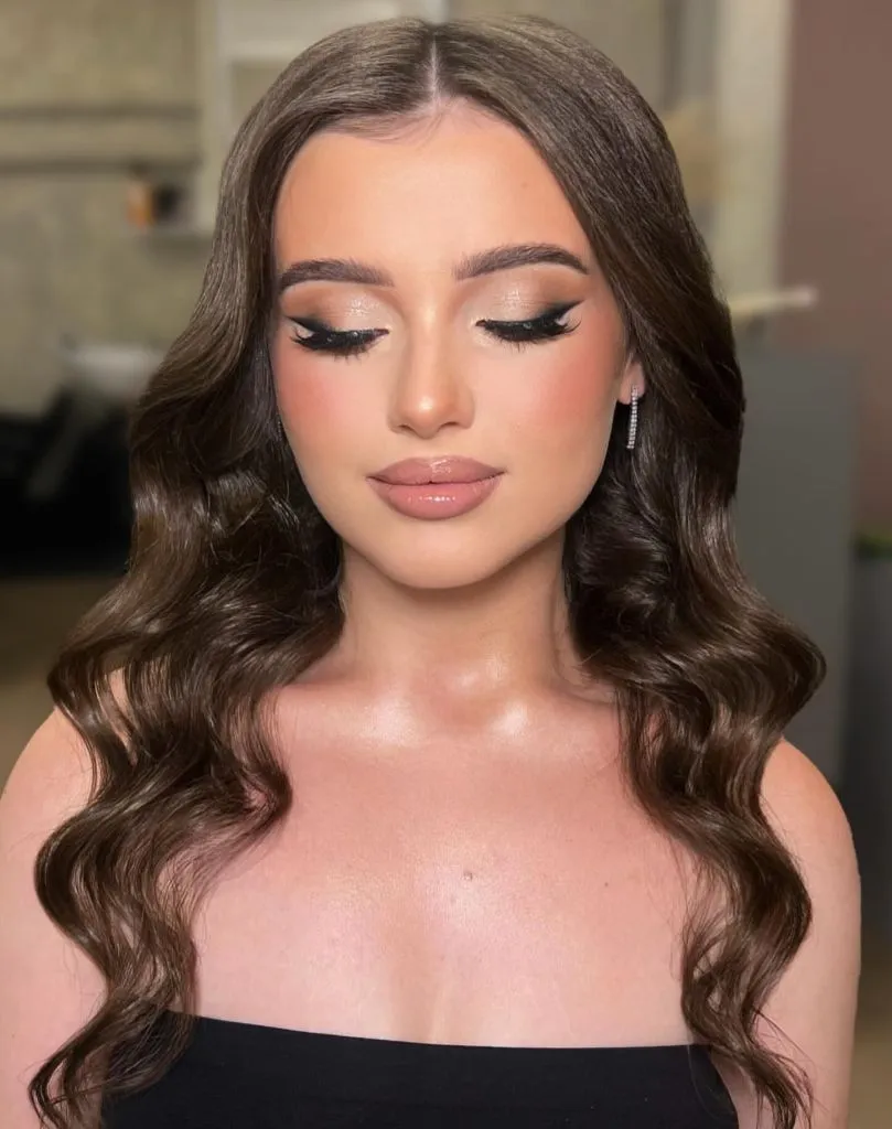 Middle Parting Hairstyles Glam Winged Liner With Centre-Parted Bridal Waves