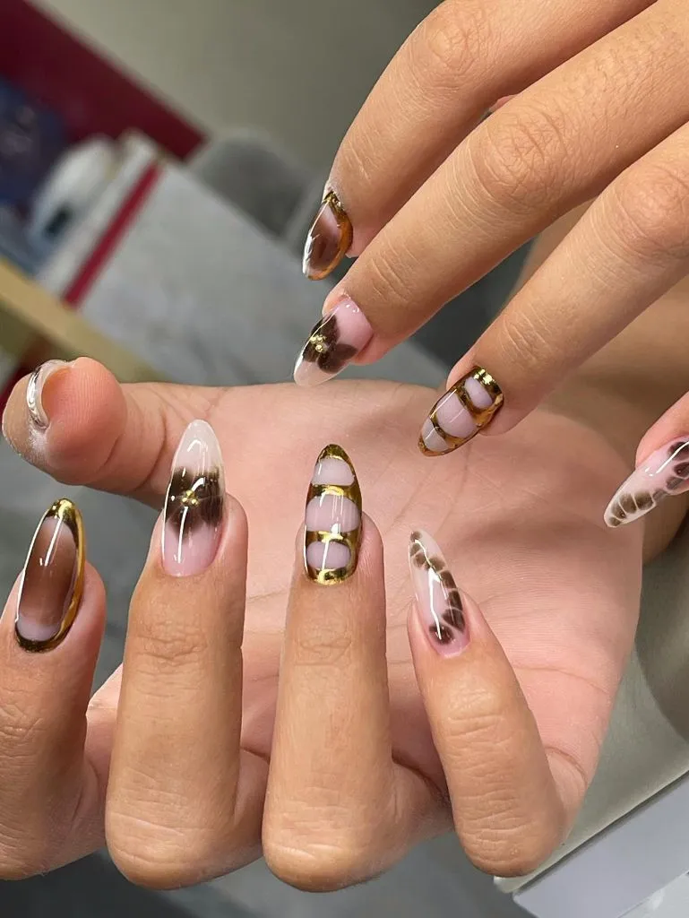 Fall Nail Colors for Dark Skin Amber And Brown Translucent Almond Nails With Gold Line Art