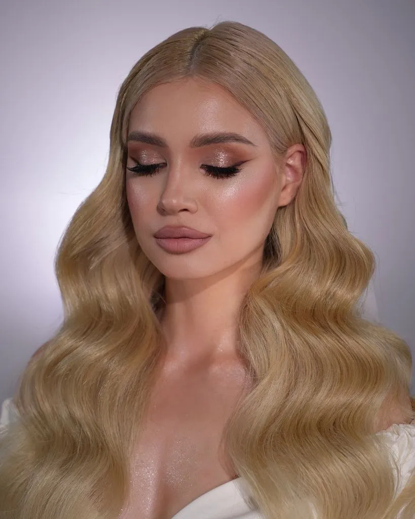 Middle Parting Hairstyles Blonde Glam Waves With Shimmer Eyeshadow And A Centre Part