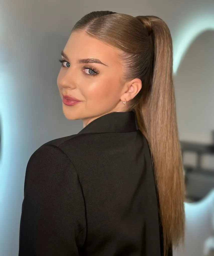 Middle Parting Hairstyles Sleek High Ponytail With A Clean Centre Part