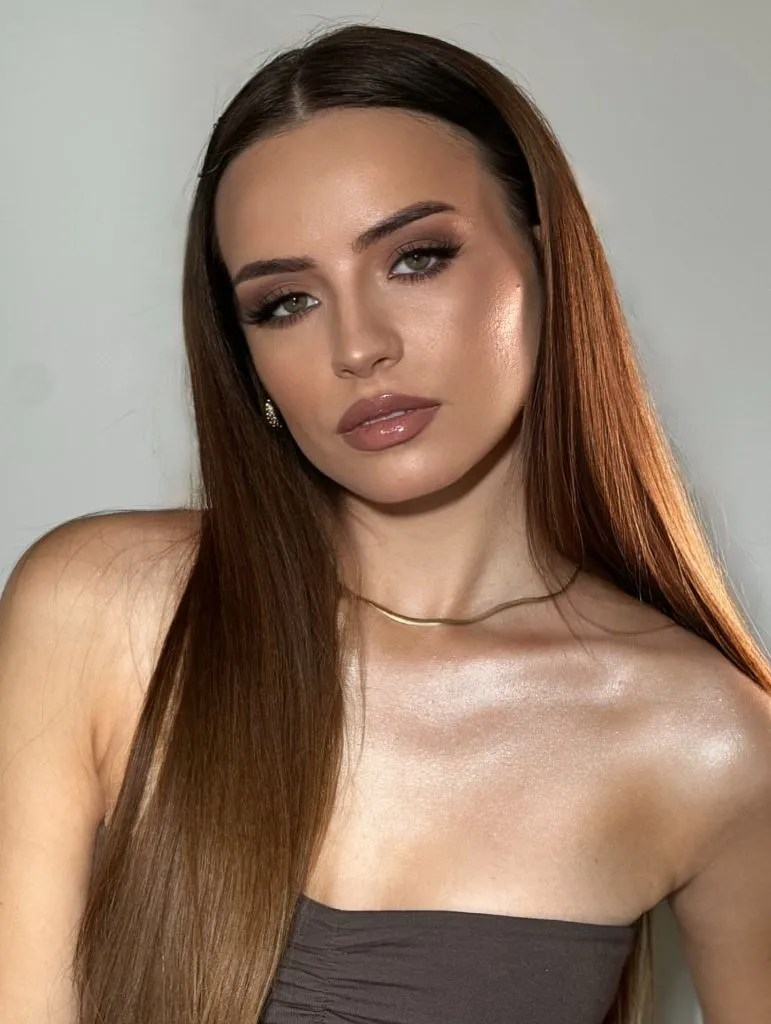 Middle Parting Hairstyles Straight Brunette With Warm Undertones And A Centre Part