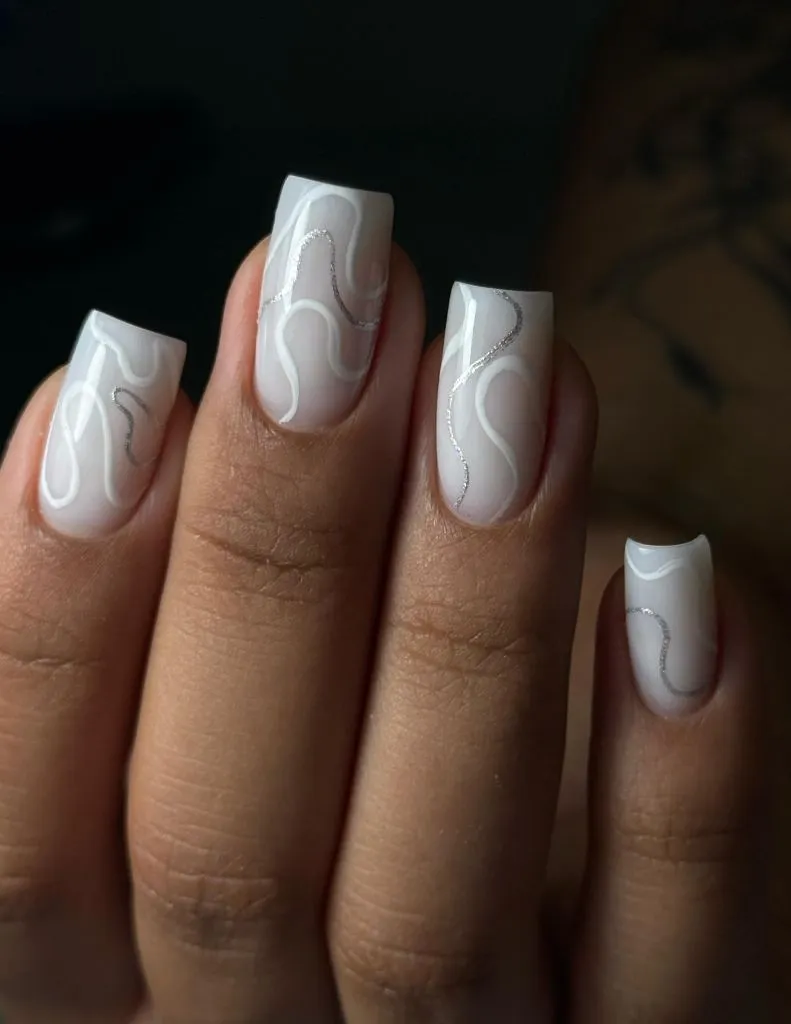 Fall Wedding Nails 2026 White Swirl And Silver Line Art On Medium Coffin Nails