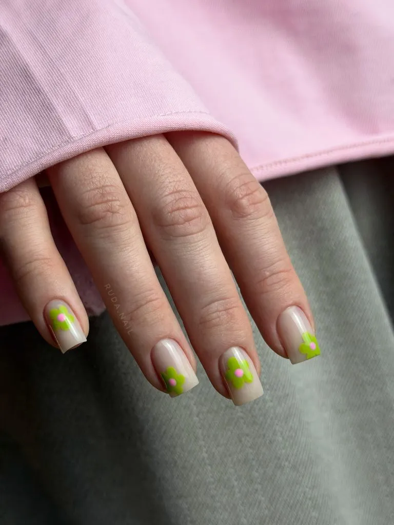 Color First Fall Manicure 2026 Minimal Nude Nails With Lime Green Flower Tips