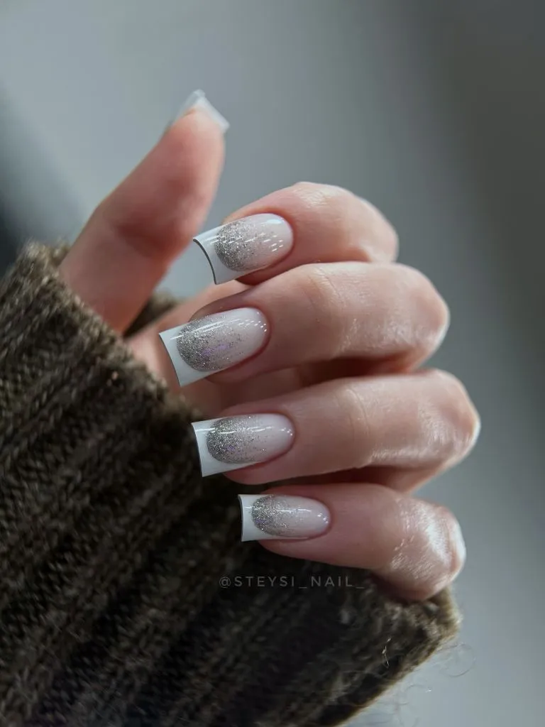 Color First Fall Manicure 2026 Milky White French Tips With Silver Glitter Fade