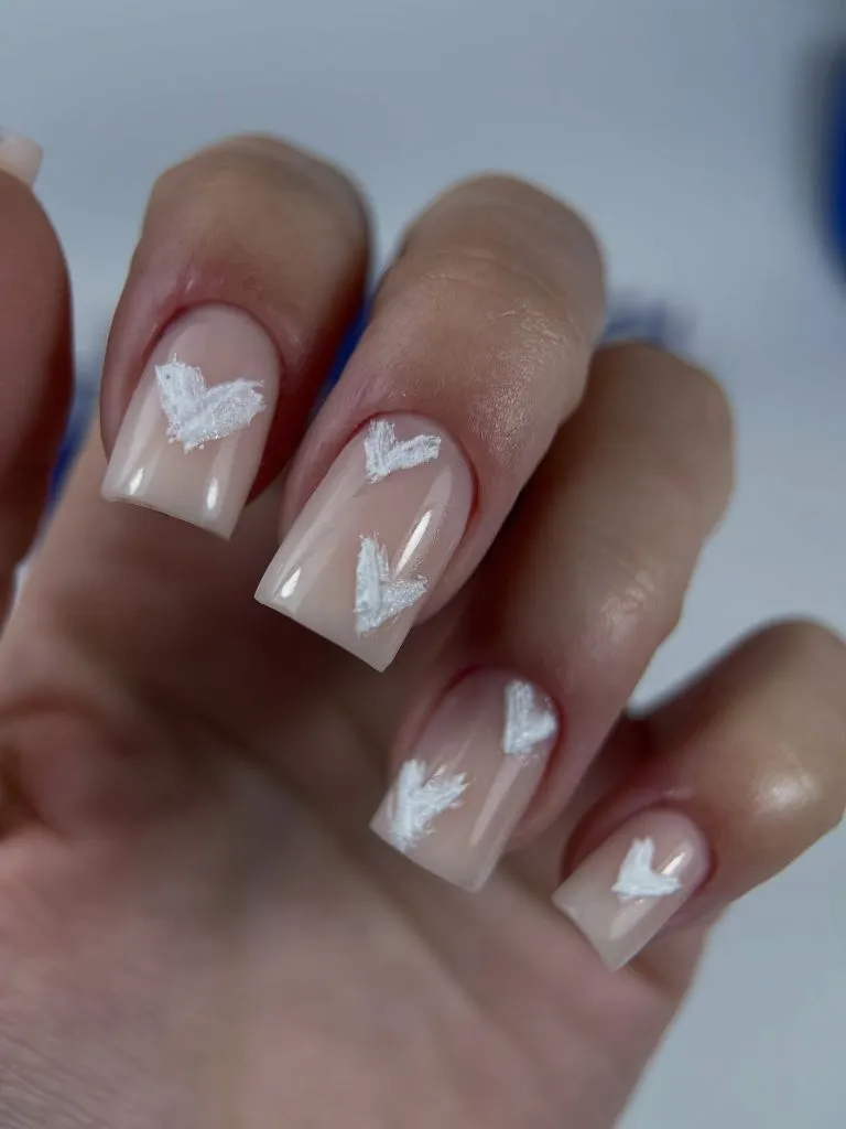 Fall Wedding Nails 2026 Nude With White Brushstroke Hearts On Short Square Nails