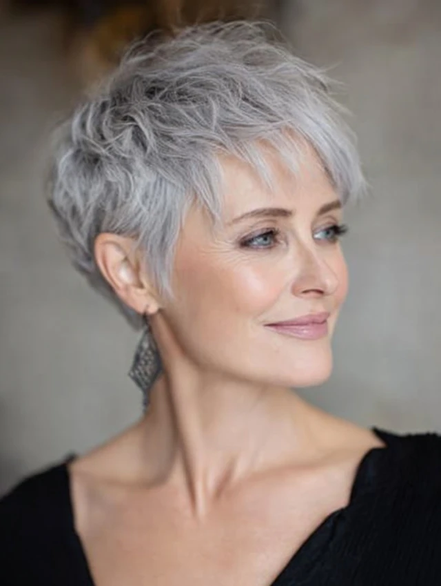 Gray pixie haircut with tapered nape