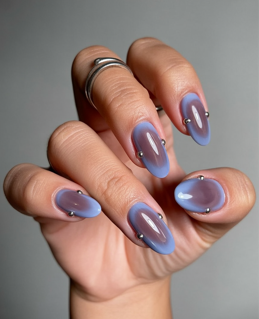 Icy Blue Aura: a frosty blue bloom suspended over clear nude