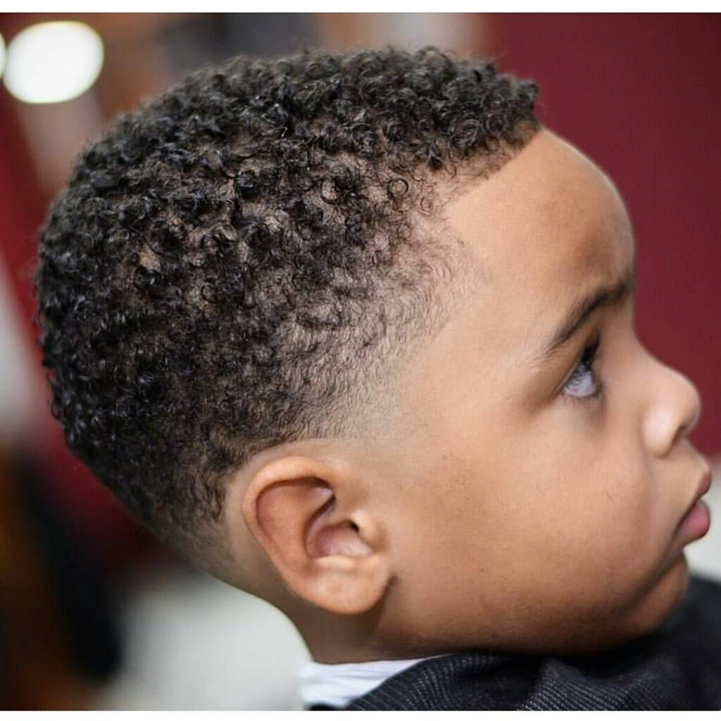 Toddler boy with a short tapered haircut and crisp line-up