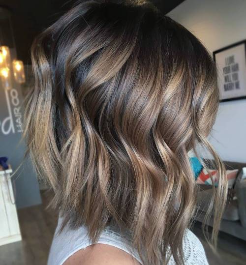 Tousled beach-wave bob with brunette balayage